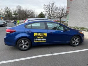 Student practicing behind-the-wheel driving lesson with 1st Class Driving School in Philadelphia