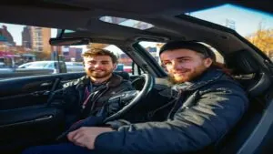 Student driver taking a lesson with a 1st Class Driving School instructor, learning how many driving lessons they need to pass their PA road test.